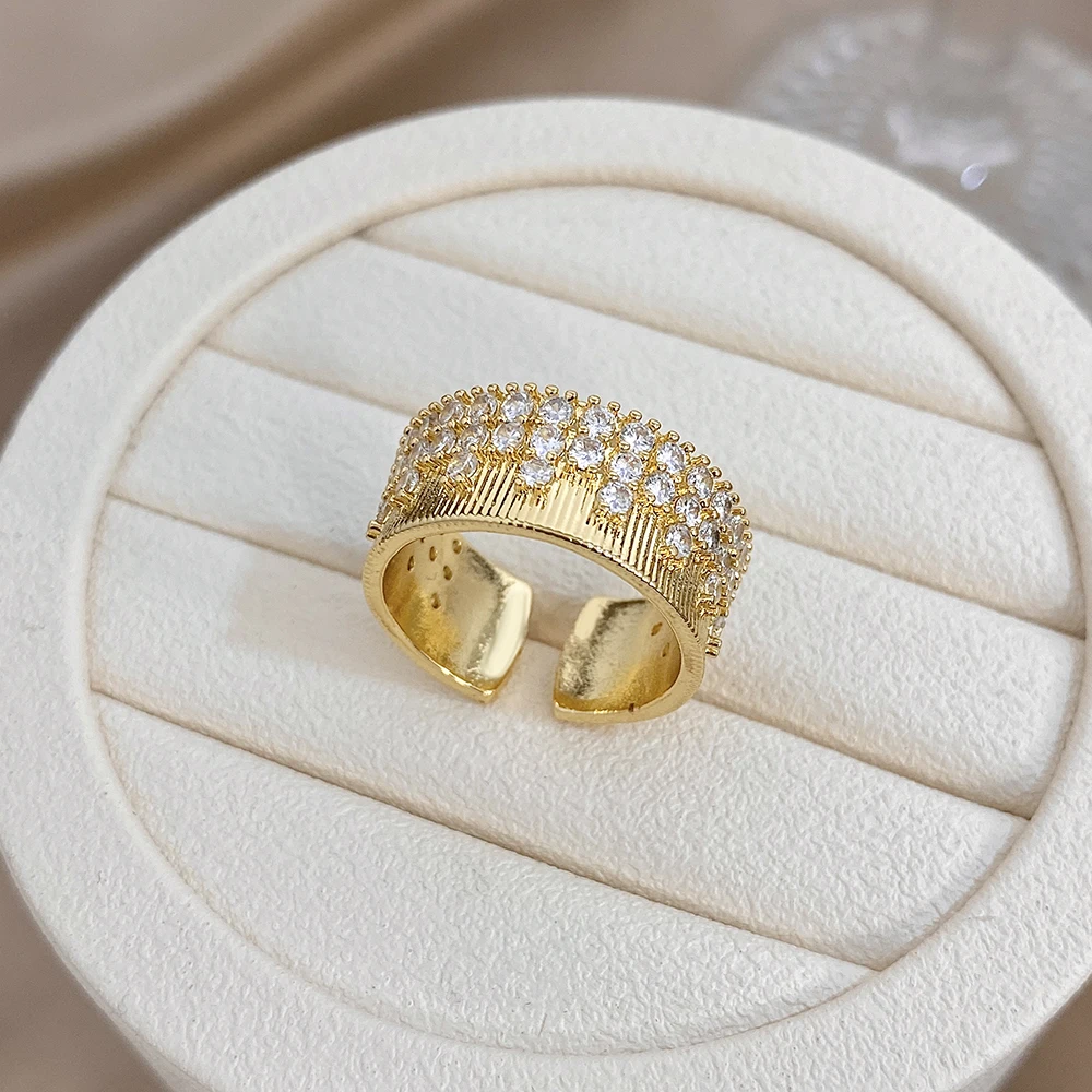 

DODOHAO Classic Stripe Zircon Inlaid Copper Ring for Women Shiny Gold Plated Waterproof Wide Opening Ring Holiday Jewelry Gift