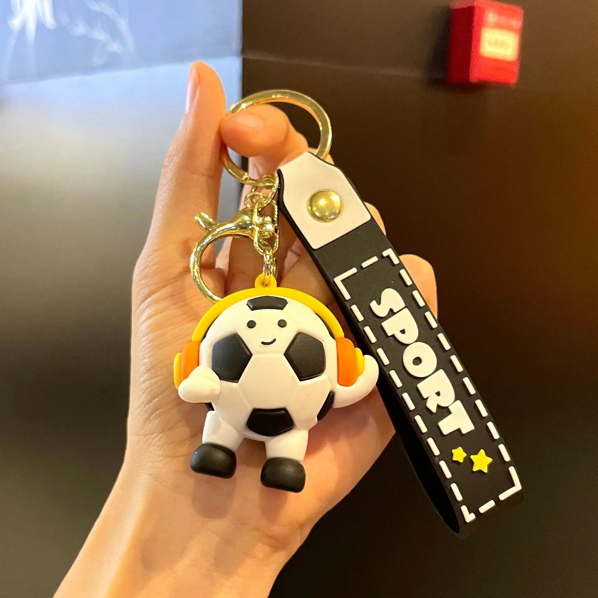 Keychain Cute Cartoon Soccer Doll With Headphones 2026 Soccer Game Souvenir Creative Gift For Soccer Fans Backpack Car Key Charm