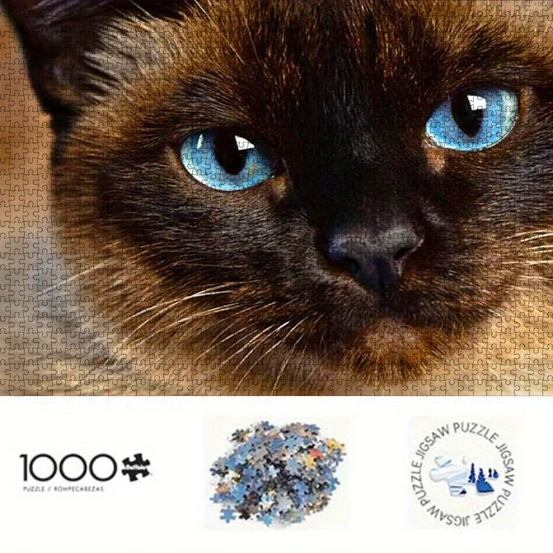 تتميز ألغاز ورقية مكونة من 1000 قطعة من قطة سيامية مقربة بعيون زرقاء، مصنوعة من الورق المقوى الأبيض عالي الجودة. إنه الأداء