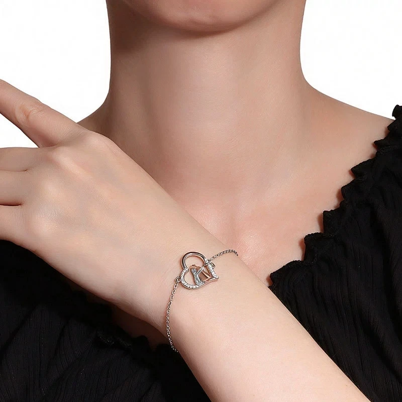 Hot Selling Two-Color Girl Holding Dog Bracelet with Zircon Inlaid Hollow Jewelry Commemorative Bracelets KOFSAC