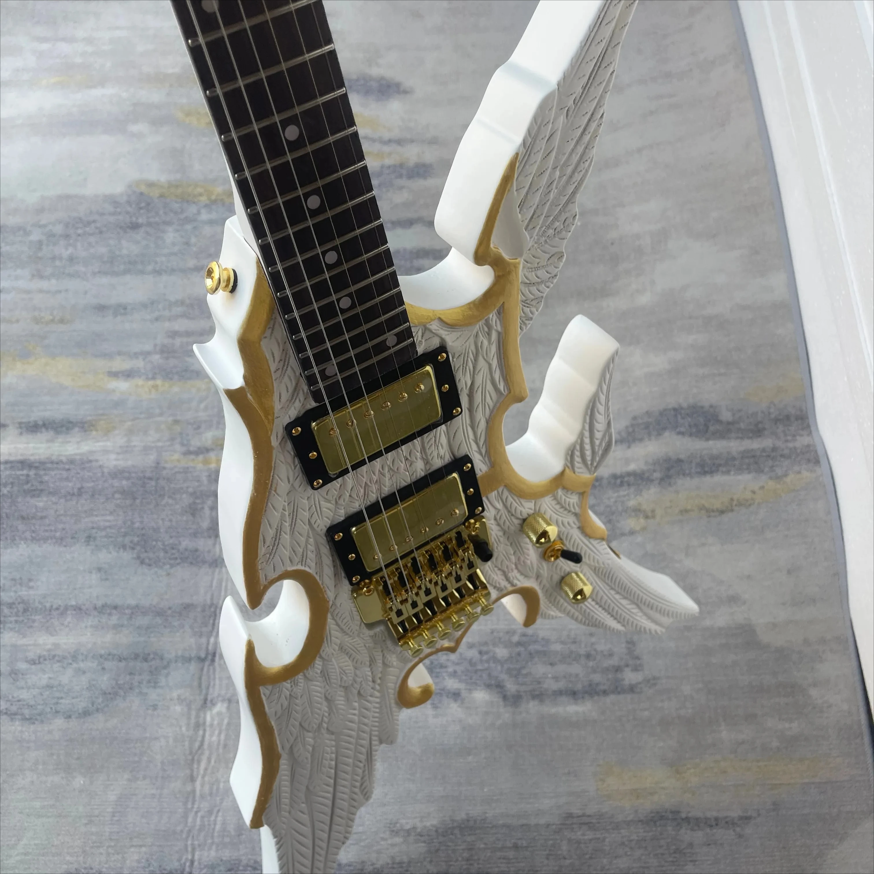New Factory Direct White Gold Three-dimensional Wing Carving V-shaped Double Rocking Shaped Electric Guitar Free Shipping
