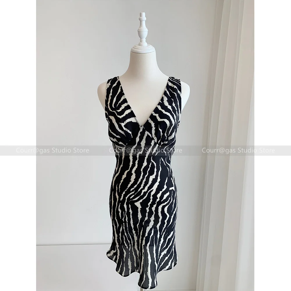 

Australia niche silk diagonal cut zebra print round neck flare long sleeve slimming short dresses