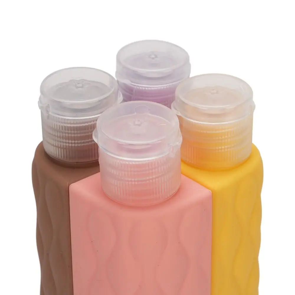 

4 in 1 Travel Bottle for Toiletries Refillable Leak Proof Travel Container Portable Reusable Squeeze Bottle Toiletry Liquids