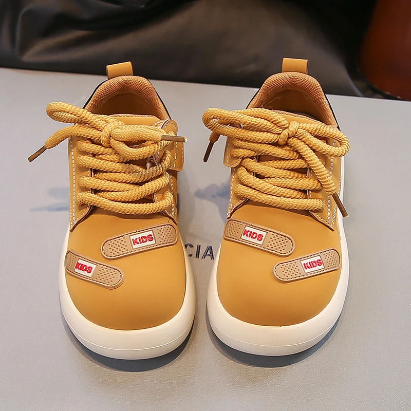 Children's PU Leather Fashion Soft-soled Non-slip Sneakers 2025 Autumn and Winter Trend Boys and Girls Warm Padded Cotton Shoes.