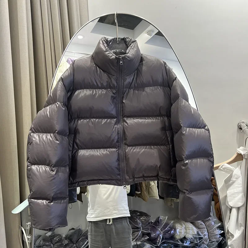 2025 hiver blanc canard vers le bas court femmes doudoune pardessus mode chaud col montant ample couleur unie femmes doudoune