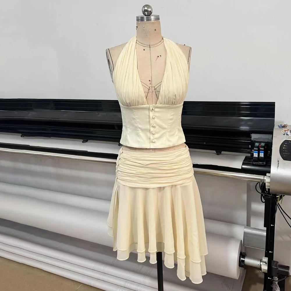 

Women's 2 Piece Outfits Sexy V-Neck Halter Backless Crop Tank Top and Casual Ruffle Side Split Mini Skirt Dress Set for Party