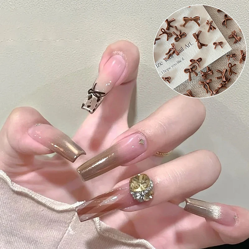 50 pezzi di decorazioni per nail art con fiocco di colore marrone, ciondoli creativi per unghie con fiocco per cravatta da caffè, per disegni di unghie fata fai da te