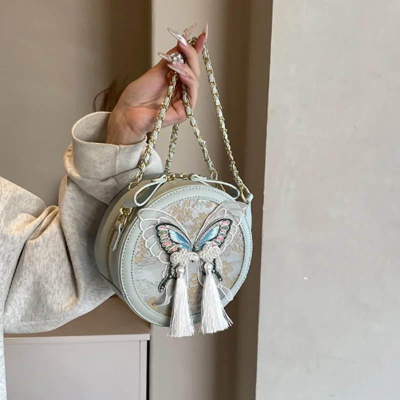

2025 New Chinese-style bag, fashionable single-shoulder bag for women, butterfly tassel personalized crossbody round bag