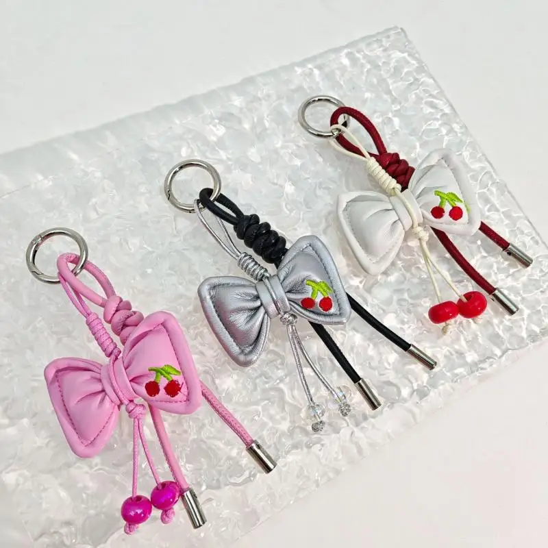 

Original Korean Style Small Fresh Dopamine Leather Cotton-filled Bow Leather Rope Woven Bag Pendant Keychain Bag Pendant