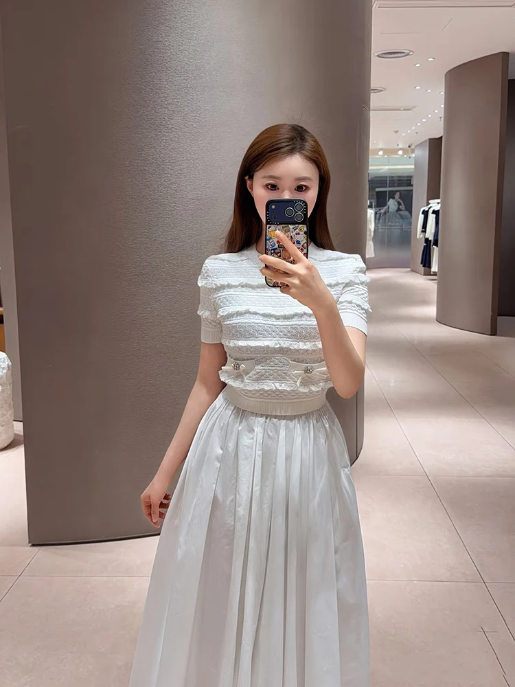 Women's white sheer knitted top - 2026 summer new style with ruffled edges and bow details, a fitted short-sleeved top.