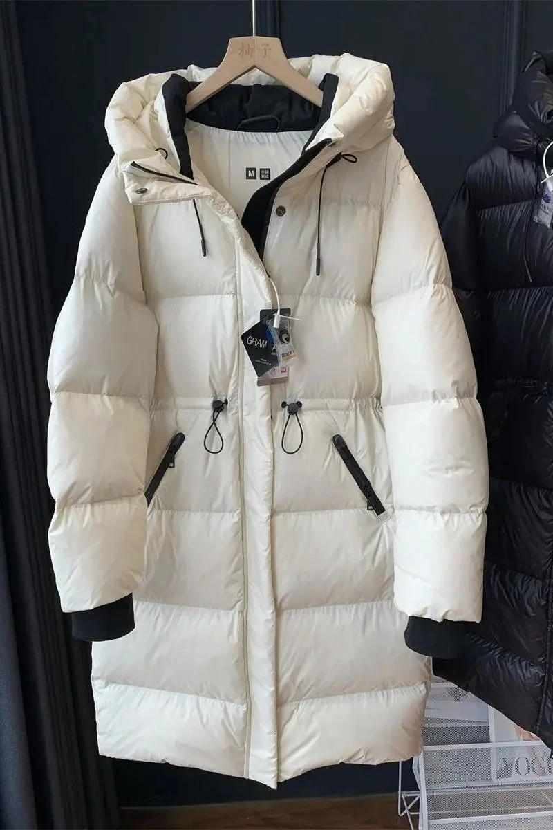 

Зимняя женская удлиненная пуховая куртка 2026 года: модная, ветрозащитная, с капюшоном, для повседневной носки