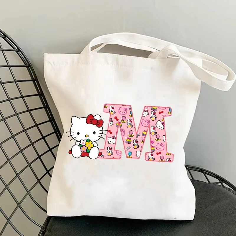 

Kawaii Sanrio Hello Kitty женская парусиновая сумка на плечо милые сумки с принтом букв большая вместительная студенческая сумка для хранения канцелярских принадлежностей