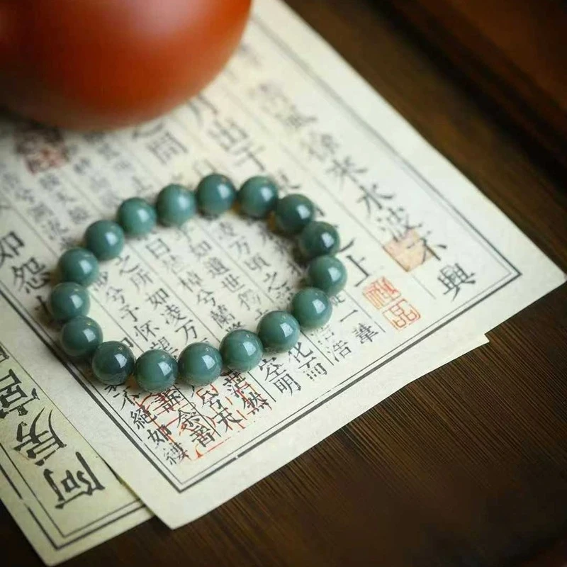 

Natural Hetian , Russian jade, old material, black's eye beads, round jadeite bracelet