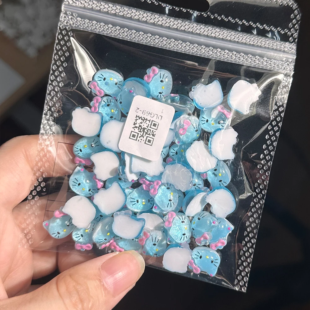 

50Pcs 3D Ice Transparent Blue Hello Kitty Nail Charms Kawaii Pink Bowknot HelloKitty Cat Head Nail Rhinestone KT Manicure Decora