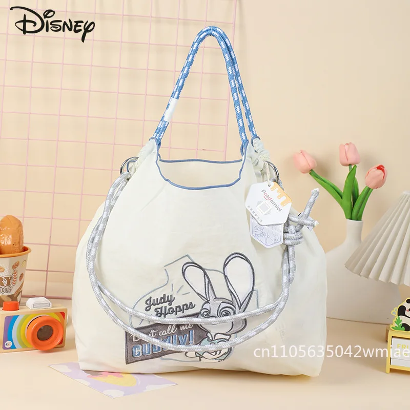 Nowa damska torebka Disney, modna, wysokiej jakości damska torba crossbody, jednolity kolor, uniwersalna, duża pojemność, torba na zakupy dla dziewcząt.