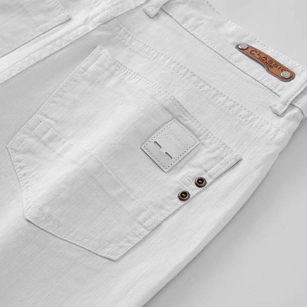 Homens jeans brancos elasticidade em linha reta fino ajuste casual macio negócios clássico marca calças moda avançada estiramento denim calças