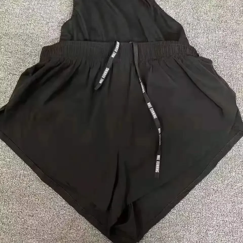Pantalones cortos profesionales para correr maratón, pantalones de entrenamiento deportivos atléticos de secado rápido para hombre, doble capa, tres cuartos de longitud
