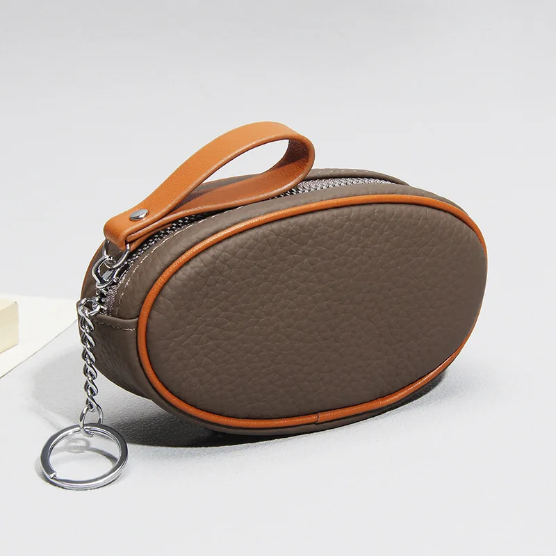 Versatile Leather Oval Mini Coin Pouches - Zippered Zero Wallet with Key Ring, Portable Storage for Earbuds, Cards & Small Items