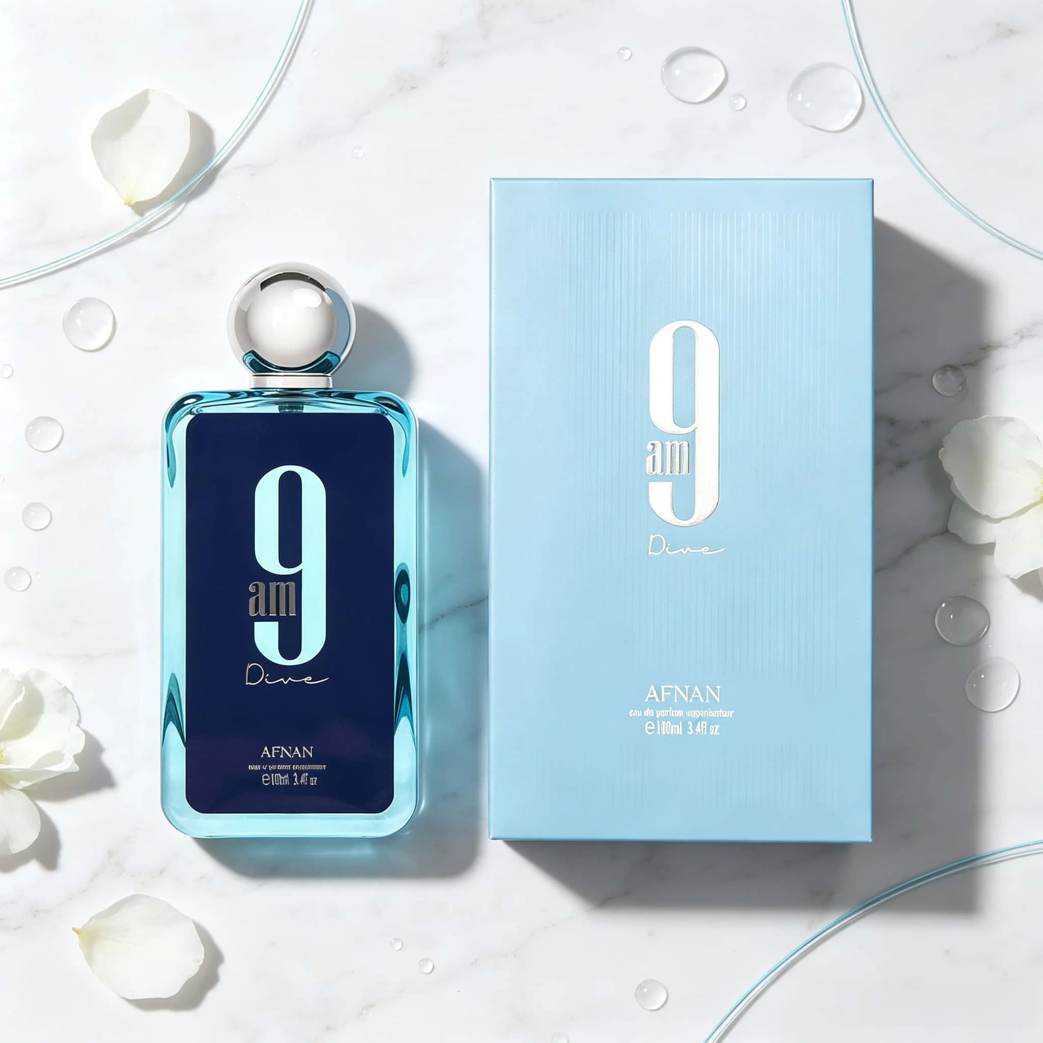 アフナン 9アム ディーバ EDP 100ml ユニセックス香水、シルバーボールキャップ付きの透明な青色の四角いボトル、スカイブルーのギフトボックス、フレッシュなオリエンタル系の長持ちするオードパルファムフレグランススプレー、日常のデートに最適。 1