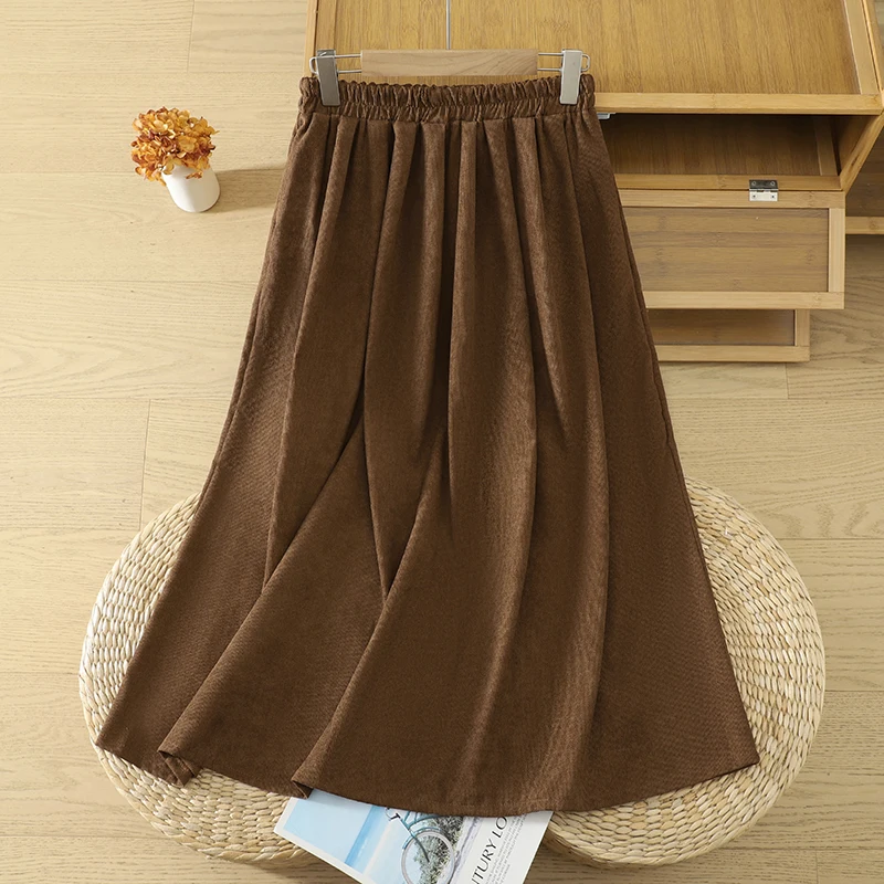 Corduroy A-Line Midi Skirt Women's Winter New Style Versatile Warm Pleated Pure Color Button Elastic Waist Half-length Skirt