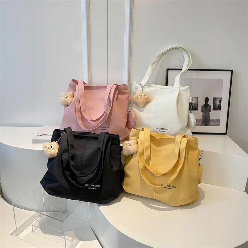 

Soft Nylon Solid Color Sweet Women's Tote Bags 2026 Hot Sale Commuting Trendy Ladies Bags Versatile Large Capacity Shoulder Bags