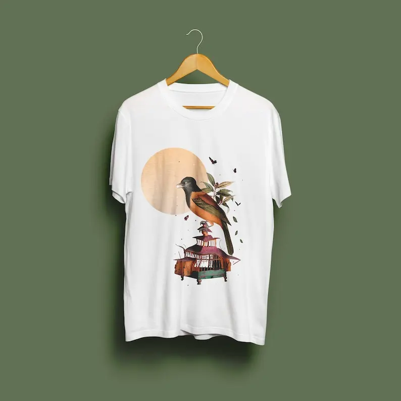 Graphic, original, colorful shirt with a cute bird illustration and a message about freedom.