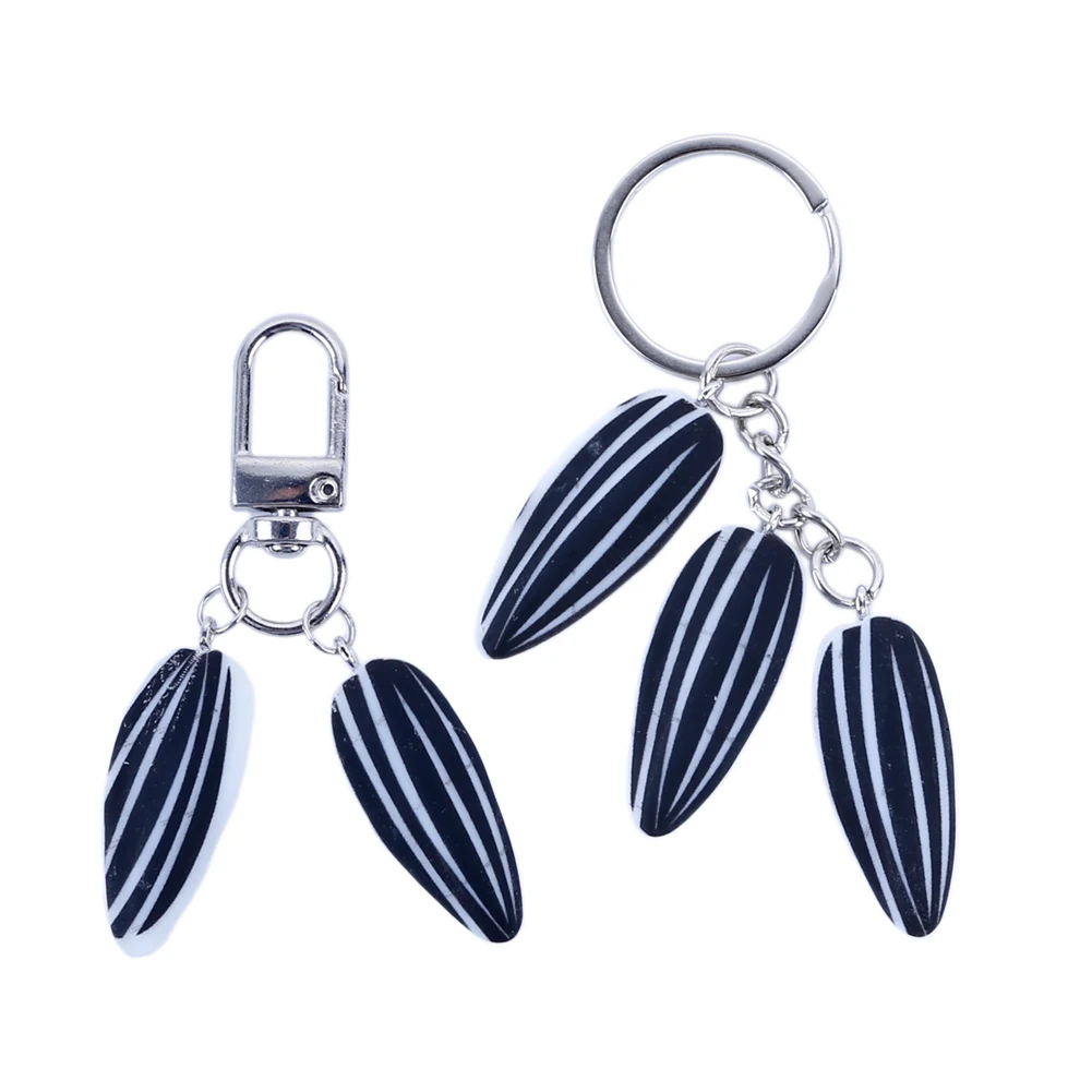 

12pcs Resin Sunflower Seed Pendant Key Ring Realistic Melon Seed Creative Party Gift Keychain Backpack Bag Charms Handbags Decor