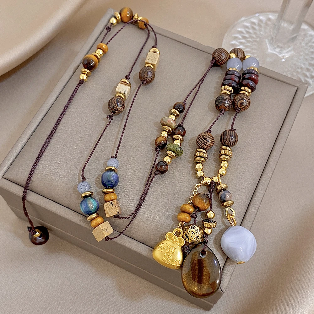 Ethnic Chic Fashion - สร้อยคอโชคเกอร์ลูกปัดหินธรรมชาติสไตล์วินเทจสำหรับผู้หญิง สร้อยคอถักมือเก๋ไก๋พร้อมพู่ห้อย สร้อยคอเครื่องประดับชาติพันธุ์ ของขวัญ
