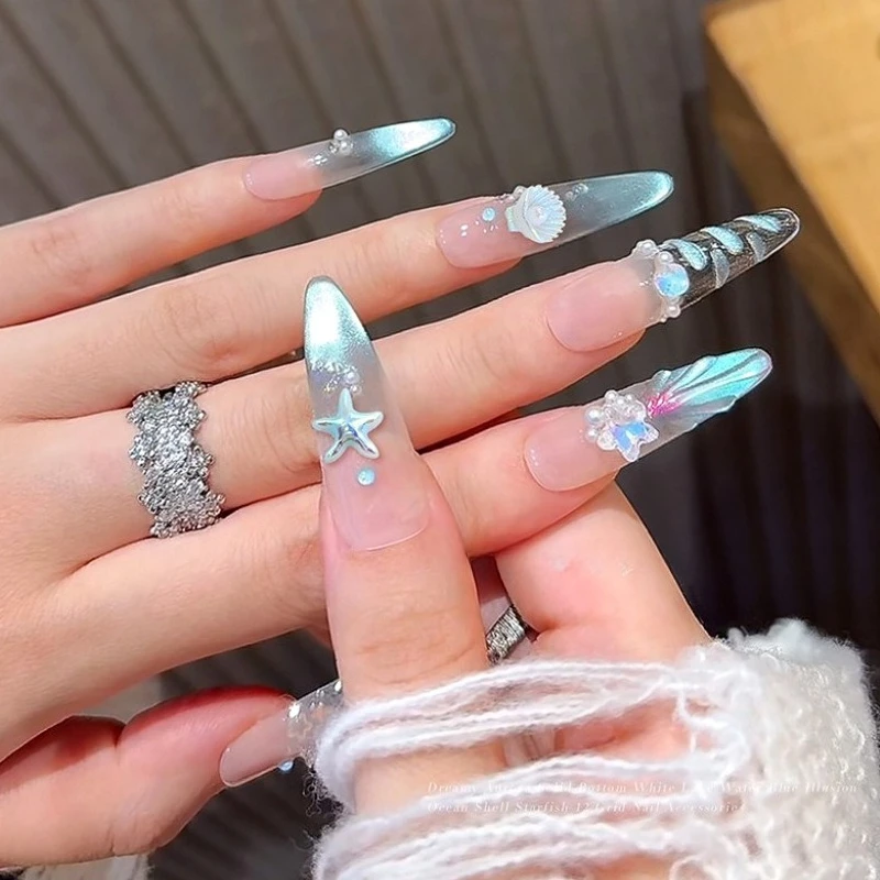 قوقعة شجرة جوز الهند حورية البحر ذيل نجمة فراشة القلب حجر الراين Bowknot عيد الميلاد ندفة الثلج مسمار الفن زينة الإكسسوارات