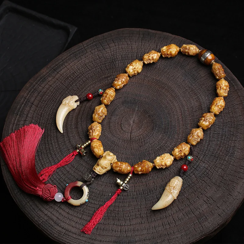 Tibetan reflux bone carving a thought holding a rosary Tibetan tassel yak bone brave six words of truth accessories