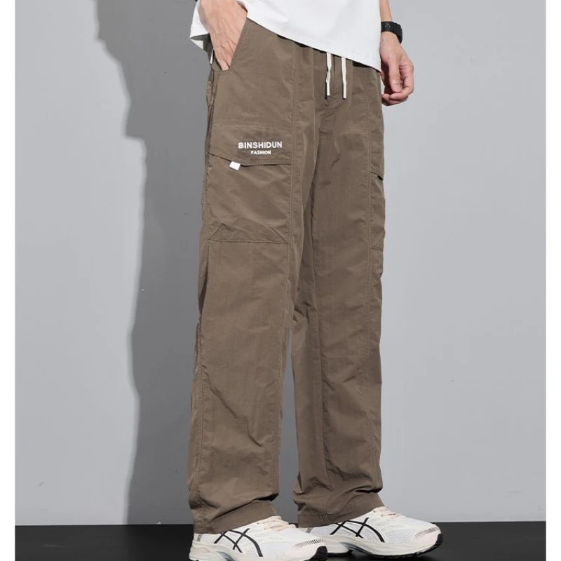 ربيع جديد نمط الرباط واسعة الساق جيب النايلون عارضة السراويل للرجال