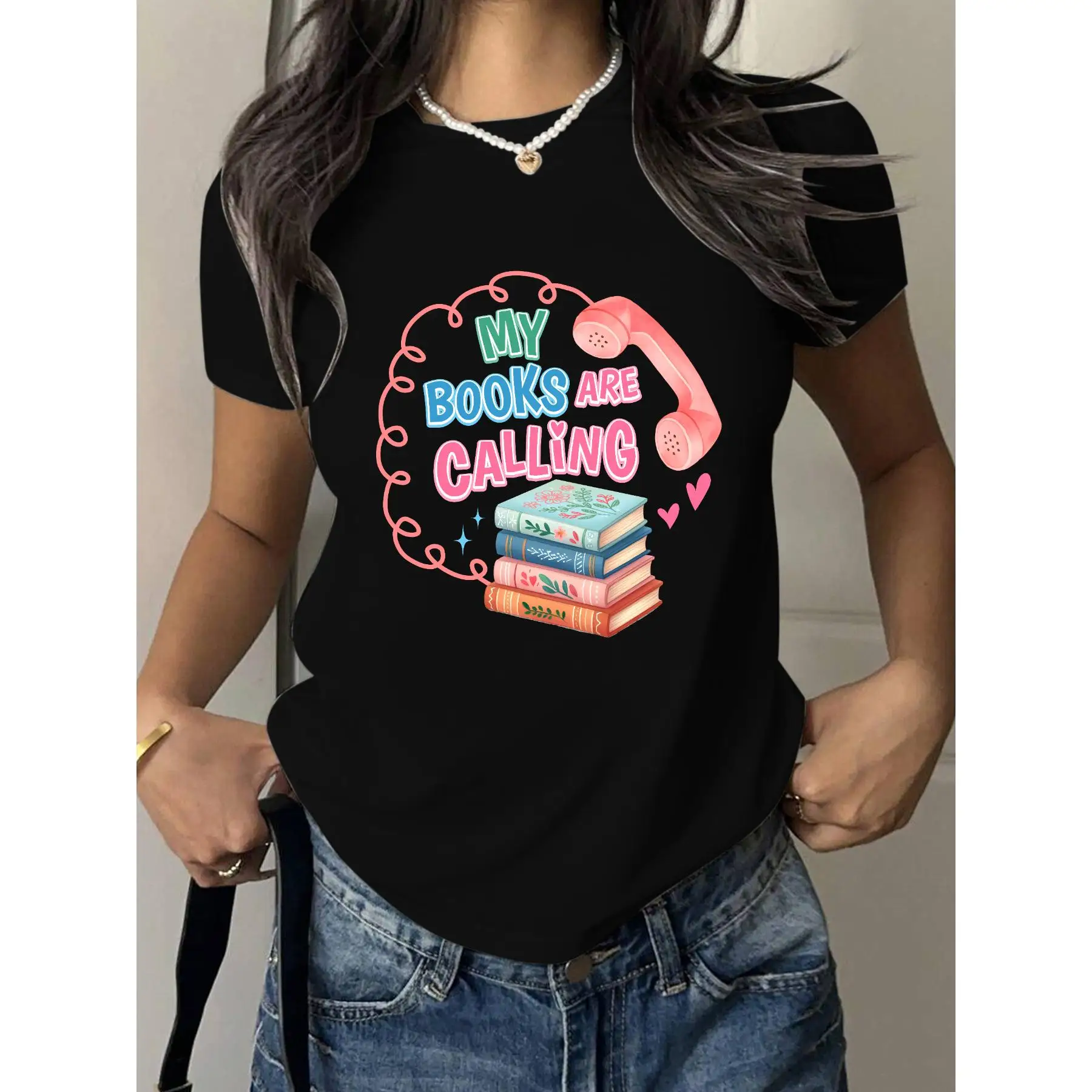 

Cute ‘My Books Are Calling’ T-Shirt for Women – Book Lover Graphic Tee, Casual Black Shirt with Colorful Book & Phone Design