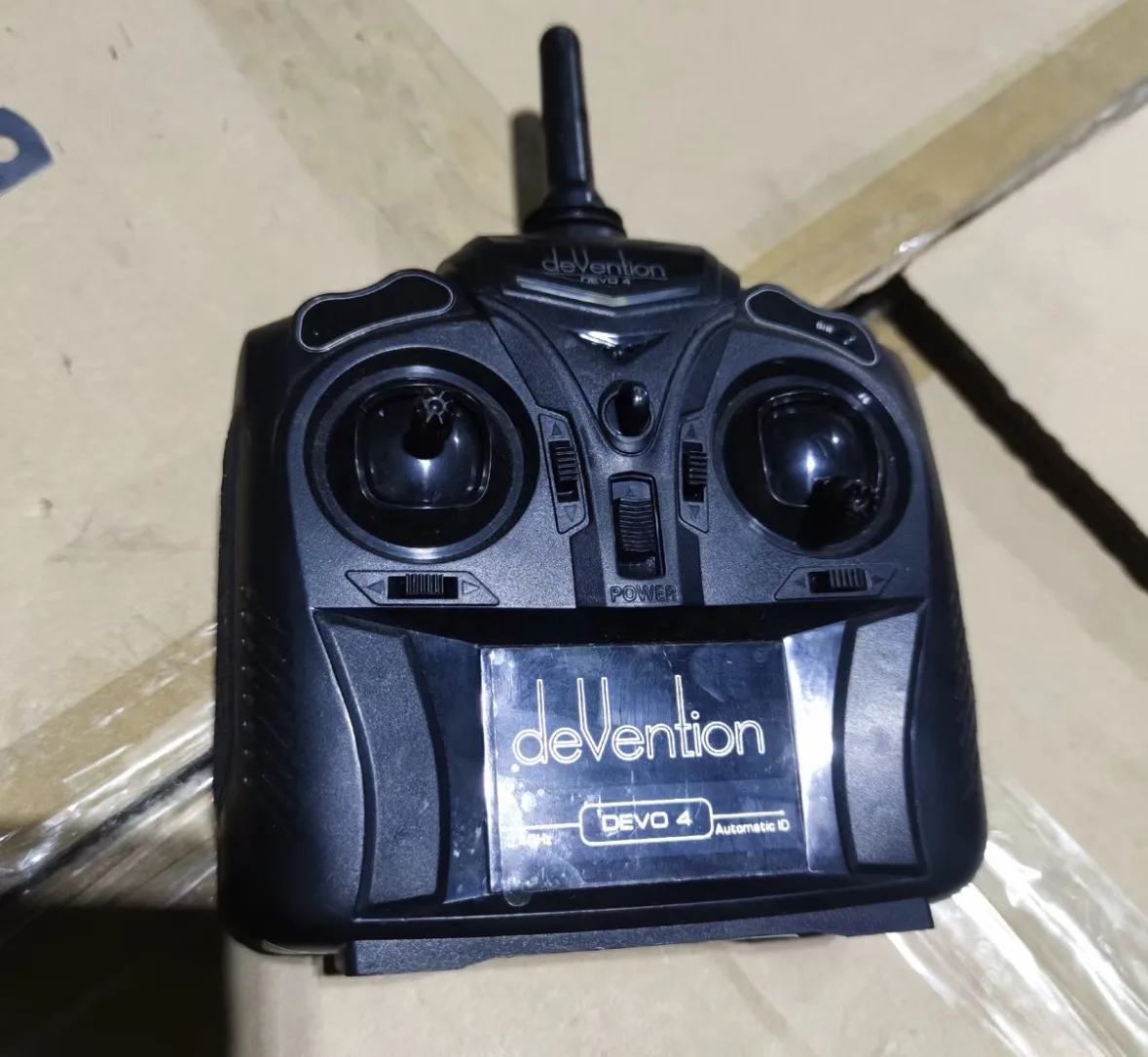 Walkera DEVO4 4 channel Micro 2.4 GHz Direct Sequence Spread Spectrum (DSSS) technology transmitter Radio controller