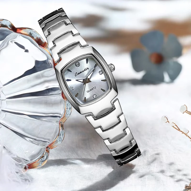 

Женские элегантные стильные кварцевые часы с серебряным стальным ремешком и квадратными заклепками