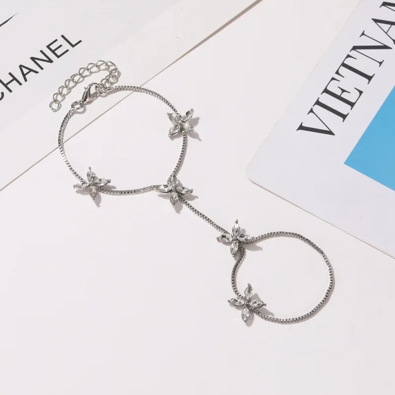 Korean version  little fresh hand decoration sweet little flower horse eye zircon finger chain female temperament four-leaf flow image 4