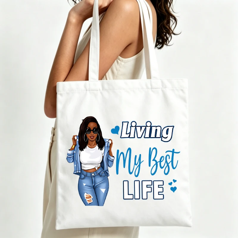 Women's canvas tote bag with illustrated graphic and slogan print, casual style for daily shopping and outings