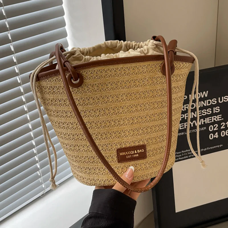 Small Grass Woven Bag 2024 New Simple and Fashionable One Shoulder Bucket Bag Fashionable Woven Beach Resort Bag