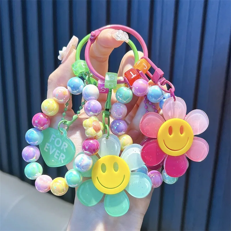 Porte-clés créatif en acrylique avec visage souriant et fleur, porte-sac exquis et adorable, porte-clés de voiture, petit cadeau.