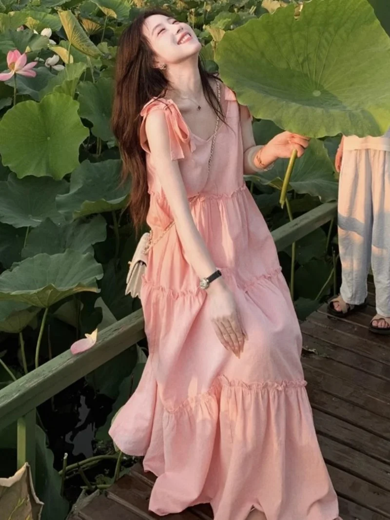 Vestido largo de playa sin mangas 2025 verano rosa francés dulce lindo pequeño fresco correa vestido de vacaciones en la playa w127