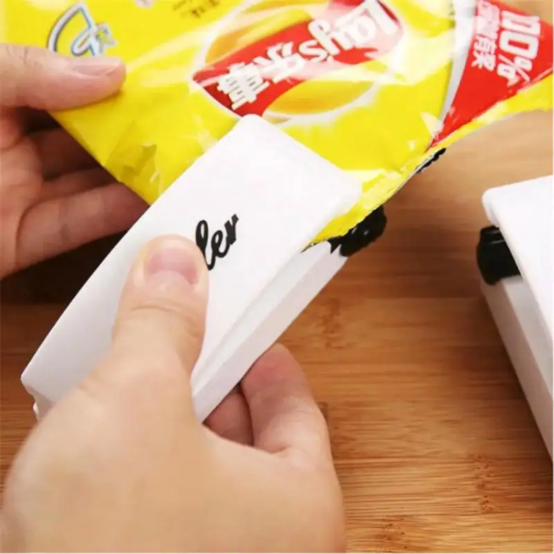 

Plastic Heat Bag Sealer Food Packaging Sealing Machine Portable Snack Bag Sealing Clip Kitchen Storage and Organization