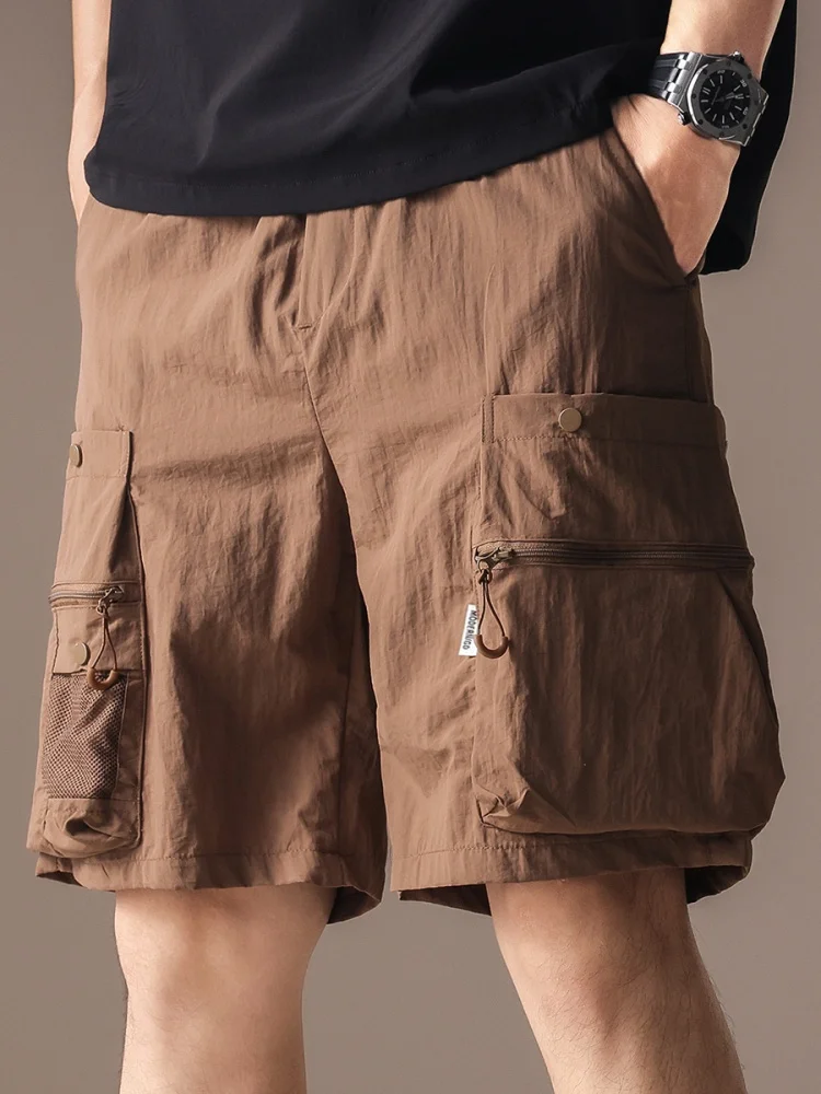 

Высококачественная рабочая одежда из ледяного шелка с крутой функцией, мужские летние тонкие свободные брюки большого размера, модные брендовые брюки средней длины пять четвертей