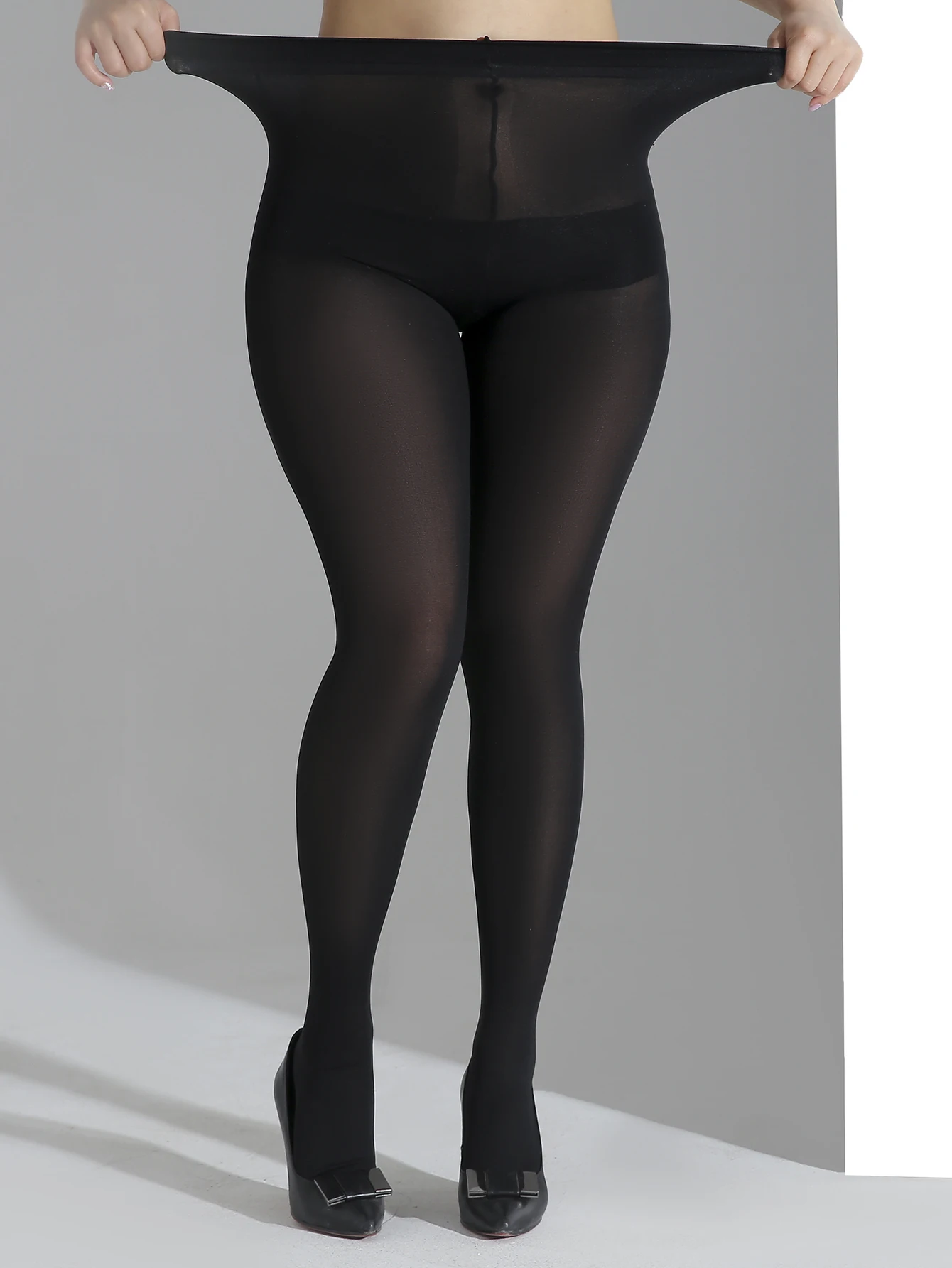 A pair of women's black tights plus size fashion plus size pantyhose