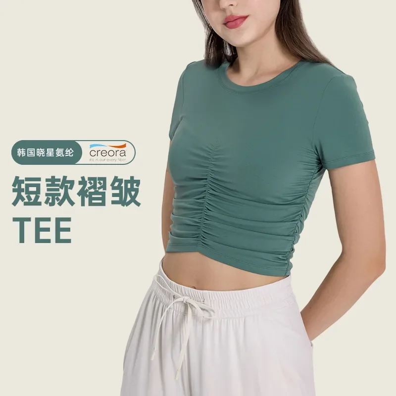 Creora Xiaoxing's new fashionable pleated sports short sleeved slim fit yoga top for women Slimming and slimming women's top