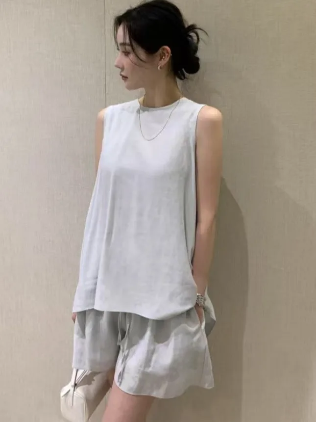 ชุดเซ็ตเสื้อกั๊กผูกเอวดีไซน์ใหม่สำหรับฤดูร้อน กางเกงขายาวเอวสูงทรงขากว้างสำหรับผู้หญิง พร้อมเข็มขัด ดีไซน์บิดเกลียว สไตล์ลำลองสำหรับใส่ไปทำงาน