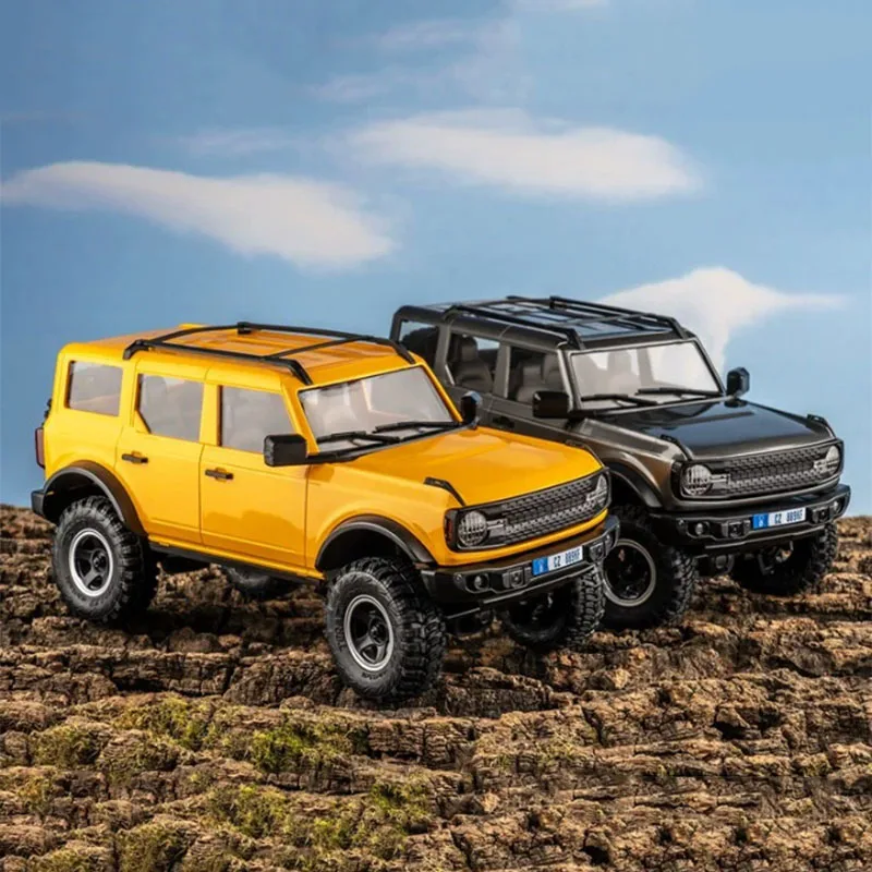 Fms 1/18 برونكس الذهب الاندفاع الكهربائية التحكم عن بعد أربع عجلات القيادة تسلق مركبة Rc على الطرق الوعرة سطح المكتب لعبة نموذج سيارة هدية