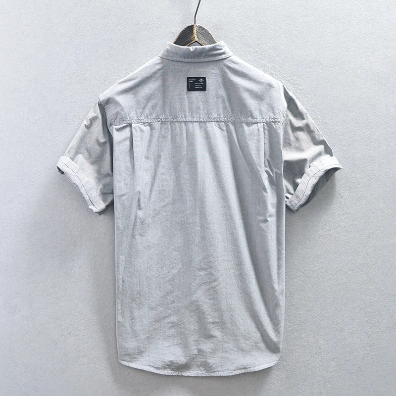 Summer men's Japanese style fresh, simple, solid color workwear style classic, comfortable breathable, loose short sleeved shirt