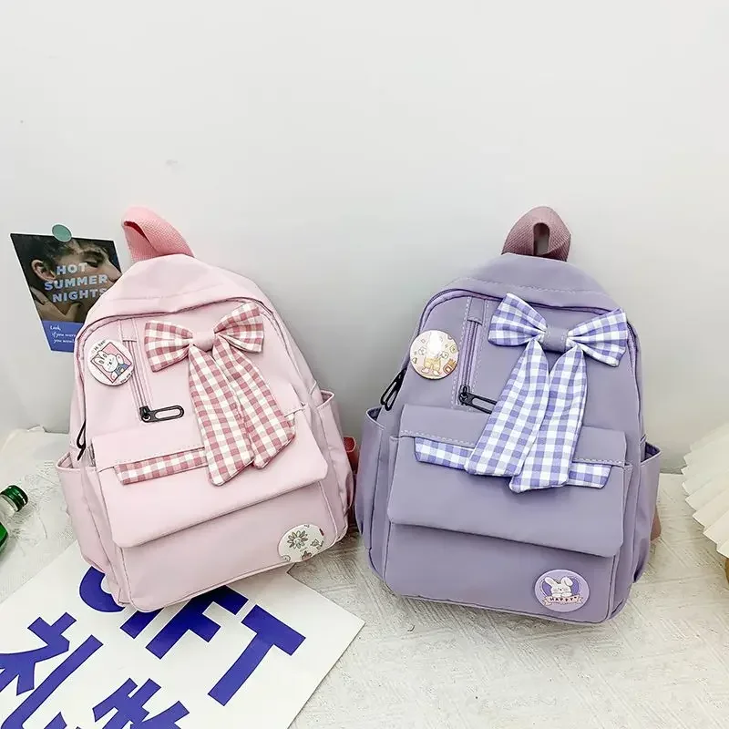 BOMO-mochila Kawaii rosa con pajarita para mujer, bolso de diseño versátil informal con Cremallera de nailon, a la moda, 2024