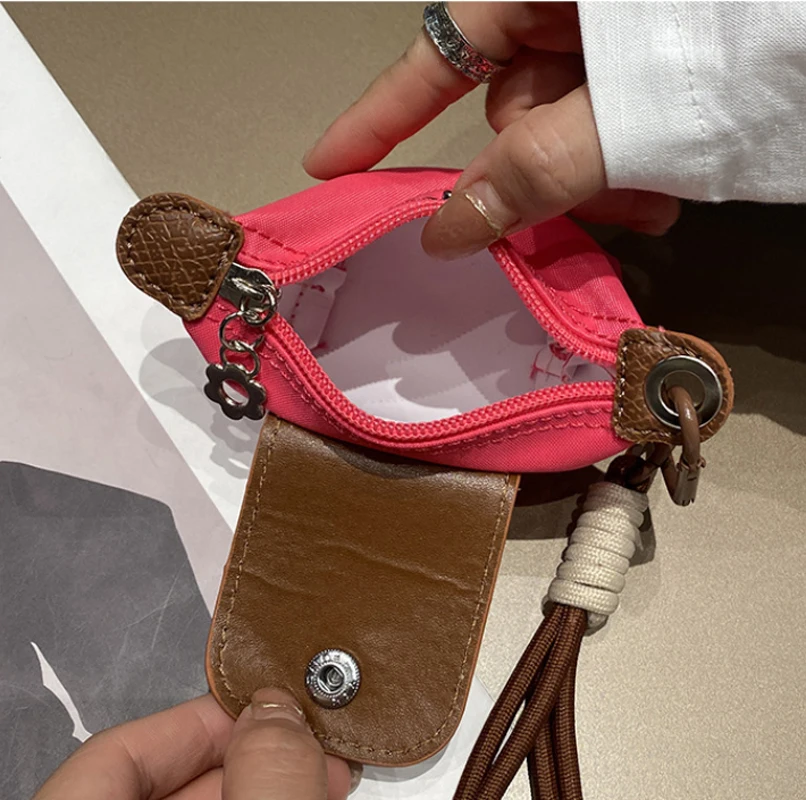 حقيبة صغيرة عصرية، حقيبة سماعة أذن، محفظة، حقيبة صغيرة من النايلون، فتحة حقيبة تخزين، مظروف أحمر، حقيبة عملات فضية، سلسلة مفاتيح