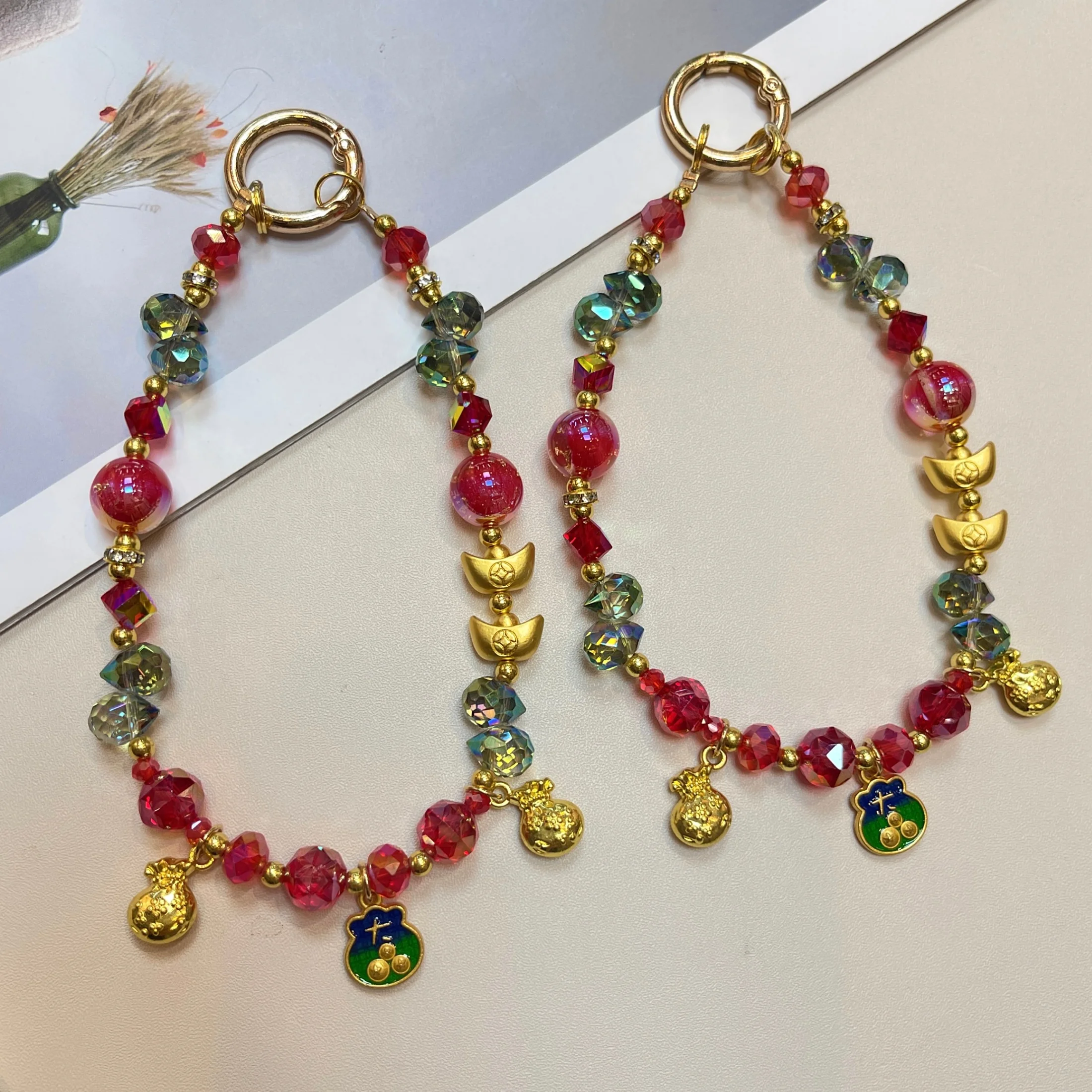 

Crystal Yuanbao Zhaocai Mobile Phone Lanyard Wrist Small Flavor Full Diamond Hanging Chain Women's High-end Water Diamond 17