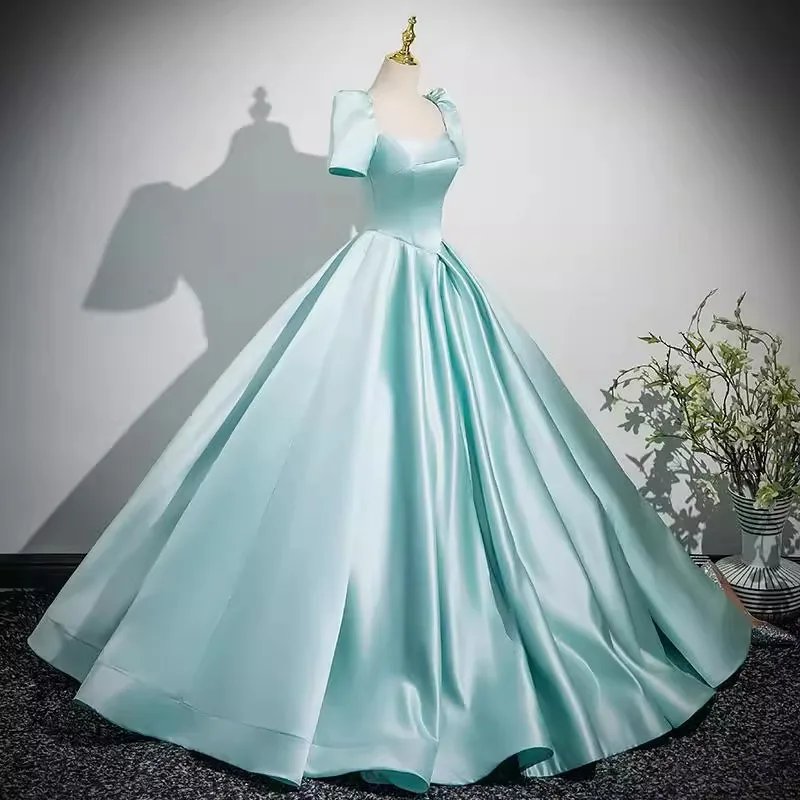 New Women's Satin Slimming Evening Dress Fashionable and Elegant Backless Strap Short Sleeved Banquet Performance Hosting Dress